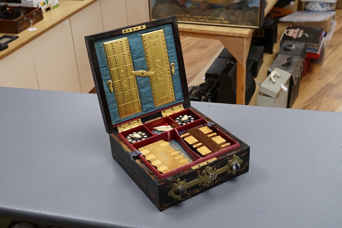 A Victorian Coromandel, brass and agate mounted games compendium, containing bezique and whist markers bone counters and inset ivory indicators, box 19cm x 19cm CITES Submission reference 3DY474P3